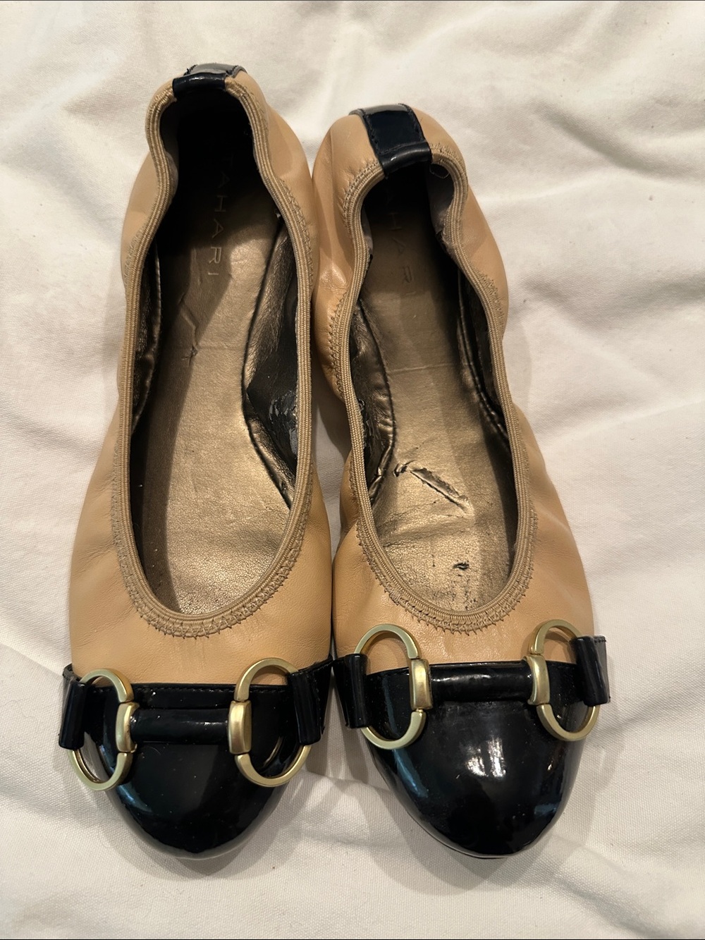 Tahari Two-Tone Beige and Black Ballet Flats with Gold Buckle Trim
